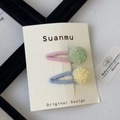 Detail view of colorful wool felt hair clips with soft pom-poms on decorative card - Plush Ball Hair Clip / Green and Yellow Pom-pom