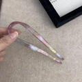 Detailed view of U-shaped marble textured acetate hair fork with Creation France engraving - Mermaid Purple