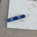 Elegant navy blue acetate hair clip featuring delicate light blue resin rose decorations - Blue