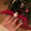 Elegant red velvet bow hair clip with large centered crystal on festive background - Burgundy