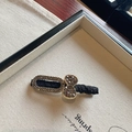 Eleganter schwarzer Haarschmuck mit grauen Strasssteinen und Schleife für Damen - Schwarz