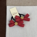 Fermagli festivi in tessuto rosso con camelia dorata per l'acconciatura di Capodanno - Elastici per Capelli a Fiocco