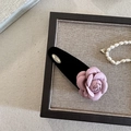 Pink camellia hair clip with black velvet finish and gold metal charm details - Pink Marble Pattern