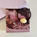Vintage elastic hair tie featuring a bright yellow oval bead on a dark brown cord - Milky Yellow