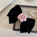 Elegant black velvet hair clip with a pink fabric camellia flower accessory - Pink Bow Hair Clip