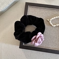 Elegant black velvet hair scrunchie with a soft purple fabric flower petal accent - Pink Hair Ring
