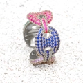 Macro shot of silver hip hop ring with pink and blue pavé zircon coffee bean link - US 7 / Silver (Multi-color Zircon)