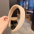 Minimalist creamy white padded sponge headband with smooth faux leather finish - Beige