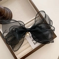 French style black mesh bow hair clip with elegant pearl pendant on jewelry display tray - Black