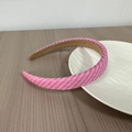 Detail of pink striped padded headband on a ceramic tray with a soft fabric texture - Pink Multi-Colored Stripes