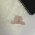 Detail of pink marble acetate hair claw clip showing a hollow semi-circular design - Pink
