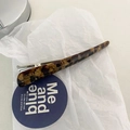 Elegant tortoiseshell pattern acetate hair clip with silver metal base and slim design - Brown