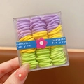 Kids elastic hair bands set in purple, yellow and green colors in a clear storage box - Candy Series