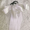 Close-up of white satin ribbon bow hair tie with long streamers on lace background - Hair Tie / White Scrunchie