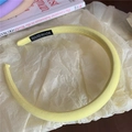 Sweet candy-colored yellow sponge headband with mesh texture and handmade label - Yellow