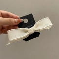 Eleganter cremeweißer französischer Schleifen-Haarclip mit gewellter Netzstruktur - Cremeweiß