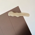 Minimalist wave hair clip in cream marble acetate finish with natural swirl texture - Milky White