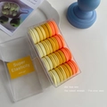 Elastic hair tie set in warm gradient colors stored in a transparent square box - Orange Series