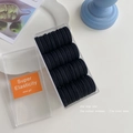 Set of 50 black high-elastic hair ties neatly organized in a clear storage box - Black Series
