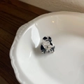 Mini marble pattern hair claw clip with France Handmade text in a white ceramic dish - Black and White Marble