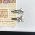 Set of two silver metallic star hair clips on a minimalist white aesthetic background - Silver Star (Single)