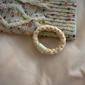 Chic apricot knit scrunchie with elastic hair tie and minimalist cartoon logo tag - Beige