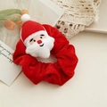 Kerst thema haarwokkel van rood pluche materiaal met geborduurde kerstman details - Kerstman