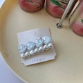 Detail of two sweet heart-shaped hair clips with pearls and colorful sequins - Off White
