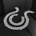 Macro detail of silver plated Cuban link chain necklace with sparkling zircon crystals - Necklace And Bracelet / Silver