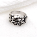 Macro detail of a gothic skull ring with realistic carvings and retro silver finish - US 8 / Antique Silver