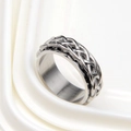 Macro view of Celtic style braided silver band ring with polished inner surface - US 8 / Silver