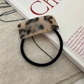 Tortoiseshell acetate hair tie with golden text on black elastic band for women - Hair Tie / Light Tortoiseshell