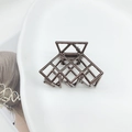 Pinza per capelli geometrica minimalista traforata con finitura grigio scuro - Cioccolato