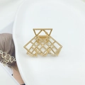 Pinza per capelli minimalista in metallo dorato con motivo geometrico traforato - Oro opaco