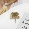 Elegant gold metal ponytail cuff with a single pearl and rustic textured finish - U-Shaped Gold Color