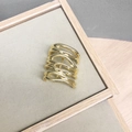 Minimalist multi-layer wavy gold hair clip with a modern metallic architectural design - Gold