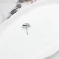 Minimalist silver moon-shaped stud earring with a polished metallic finish - Silver