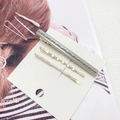 Three-piece set of stylish hair clips with gray pearl, golden wave, and rhinestone details - Gray