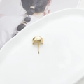 Elegant gold metal ponytail hook with brushed finish on a minimalist ceramic tray - 1# Gold