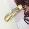 Minimalistische goldene Haarklammer mit gewelltem Durchbruchmuster für Damen - Gold