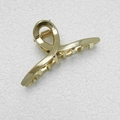 Elegante kleine haarklem van gepolijst goud metaal met een uniek oneindigheidsontwerp - Goud