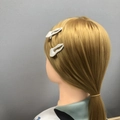 Irregular matte silver alloy hair clip on blonde hair showing 2-piece set design - 2PCS / Matte Silver