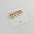 Juego de pinzas para el cabello en acetato jaspeado marrón y metal dorado ondulado - Naranja