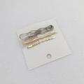 Set de 3 clips de pelo con ondas de acetato mármol gris y horquillas metálicas doradas - Gris