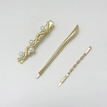Set de tres horquillas doradas con perlas y texturas metálicas trenzadas para mujer - Estilo Liso Minimalista / Dorado