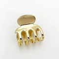 Close-up of golden alloy square hair claw clip with a polished mirror finish - Gold