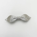 Detail of silver alloy bow hair clip with vertical brushed metal texture and spring clip - Bowknot Style (Silver)