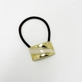 Detail of high-elasticity black hair tie with textured metal and white enamel inlay - Square Enamel White Gold