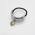 Detail of silver polished metal ponytail cuff with a large heart rhinestone pendant - Style C (557-Style C Silver)