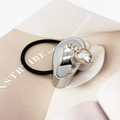 Detail of silver water-drop metal and crystal heart pendant on minimalist black hair tie - Style D Silver (555-D Silver)